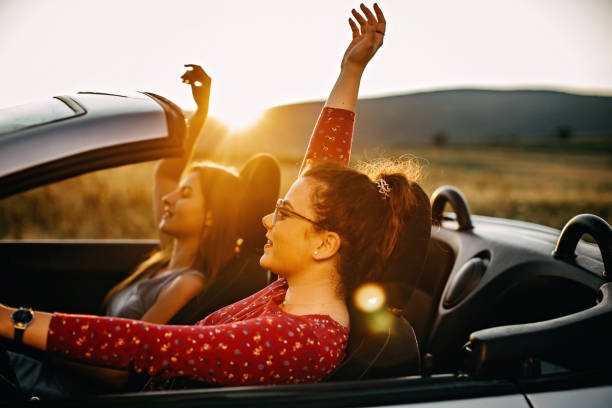 istock Young women traveling by car 1166432145