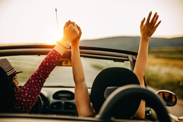 istock Young women traveling by car 1166432751