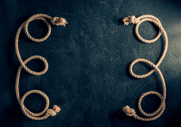 istock ship rope at wooden board background 1166434469
