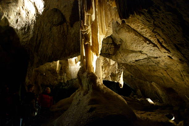 istock in a cave - stalactites and stalagmites 1166434713
