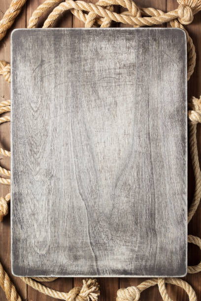 ship rope at wooden board background