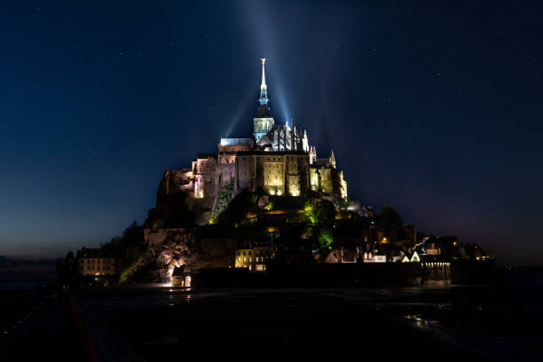 istock Mont Saint Michel view at night with lights 1166435411