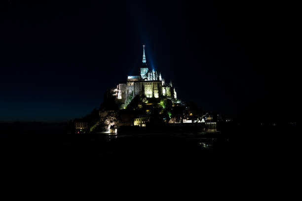 istock Mont Saint Michel view at night with lights 1166435412