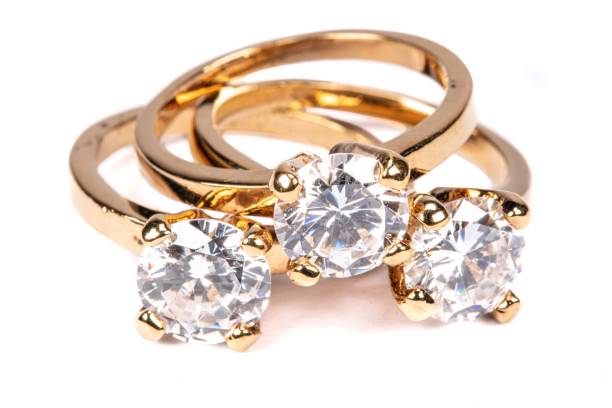 istock Close-up of clear stone gold rings 1166436155