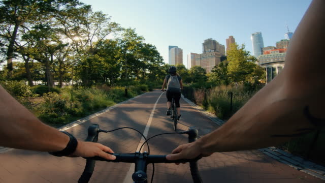 POV bicycle riding: man with road racing bike in New York