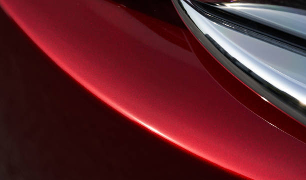 istock red metallic paint coating car body 1166436604