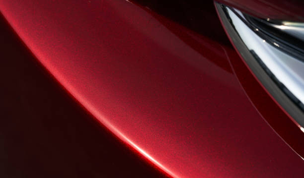 istock red metallic paint coating car body 1166436639