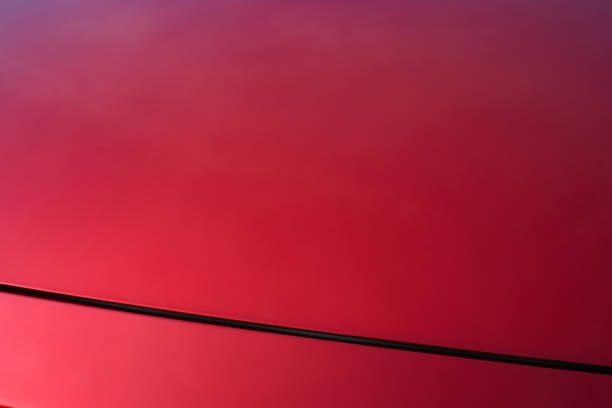 istock red metallic paint coating car body 1166437584