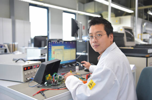 istock engineer at the workplace - assembly and development of electronics in a modern factory 1166438060