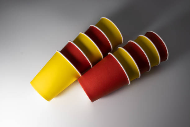 istock Two piles of paper cups on the table. 1166438093