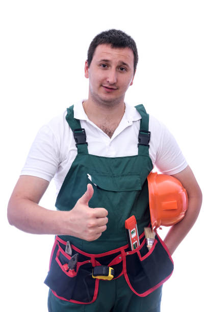 istock Man in protective uniform with helmet isolated on white 1166439923