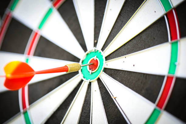 istock Close-up image with a dart in the bulls eye of a practice target 1166445024