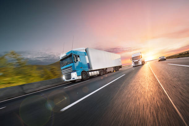 istock Truck with container on road, cargo transportation concept. 1166446960