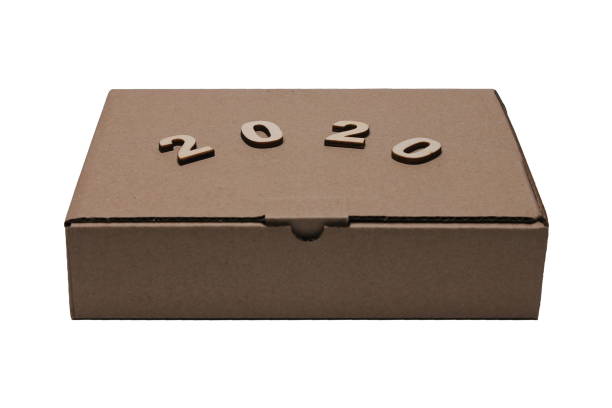 istock 2020 numerals of the new year on the Cardboard brown closed rectangular box 1166448681