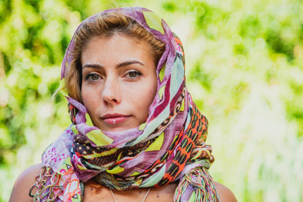 istock A boho Styled young beautiful woman outdoors in a warm summer day 1166450930