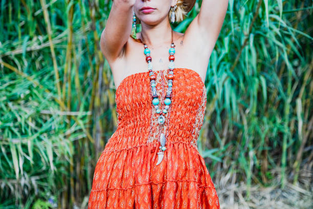 istock A boho Styled young beautiful woman outdoors in a warm summer day 1166450931