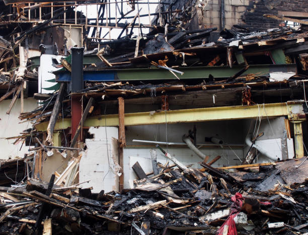 istock black burned debris and timber and steel beams in a collapsed building destroyed by fire 1166455946