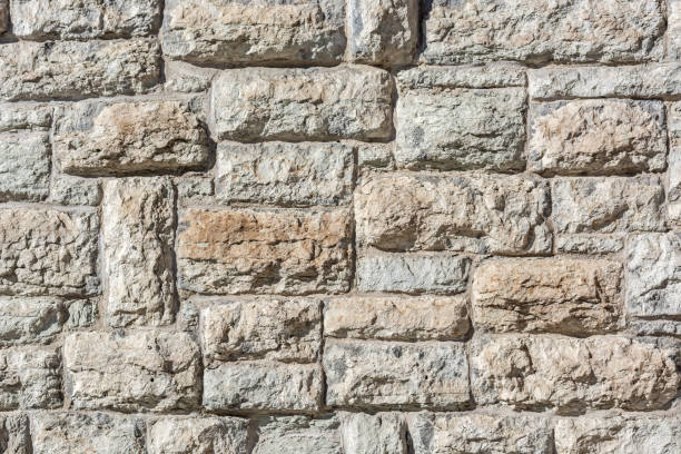 istock Fragment of an old stone wall. 1166463859