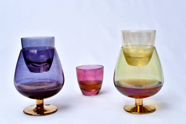 istock Colorful drinks glass cup on table on white background. 1166466102