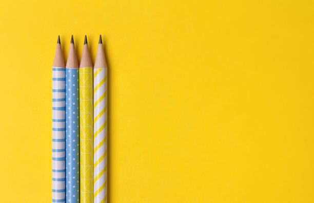 istock School office supplies at yellow background with copy space. 1166466393