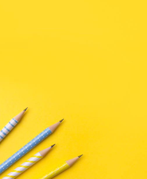 istock School office supplies at yellow background with copy space. 1166467534