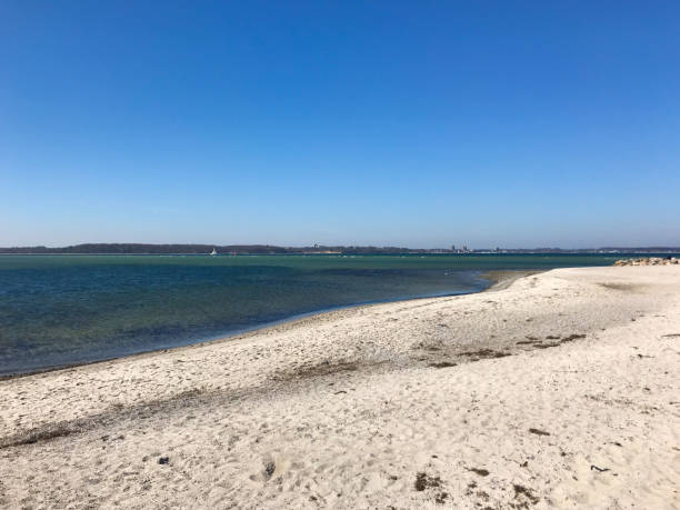 istock Beautiful sea scene in Germany with white sand on foreground 1166468442