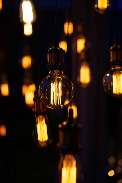 istock Edison lamps decorative group garland suspended wires 1166468567