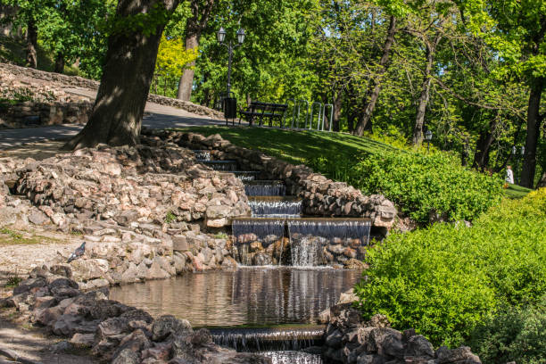 istock Small Water Cascade In The City Park. 1166473143