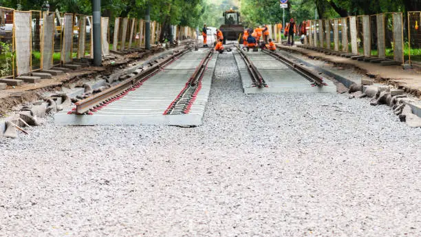 repair of tram tracks in Moscow city - laying of new rails of tramroad on concrete sleepers