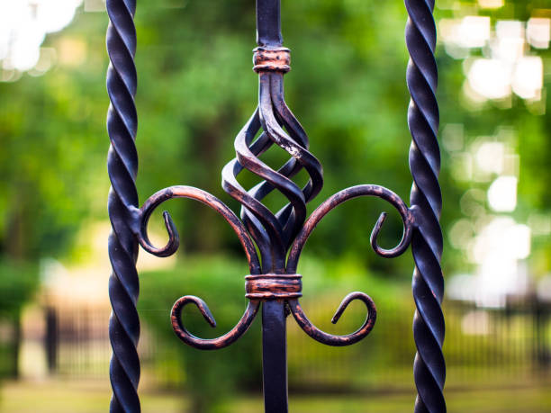 istock decorative elements of the fence on a background of greenery 1166474669