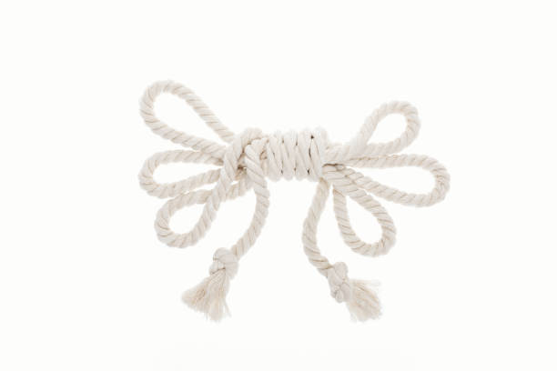 istock white and twisted rope with knots isolated on white 1166478339