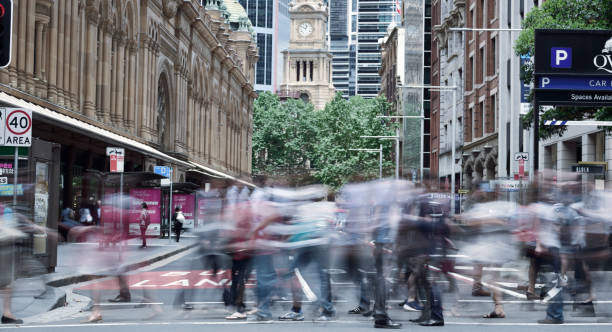 istock People crowd crossing street in central Sydney 1166478397