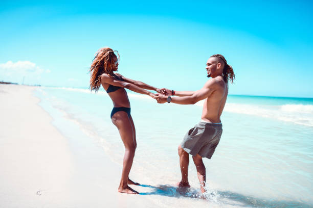 istock Couple Dancing And Swinging At The Beach 1166479873