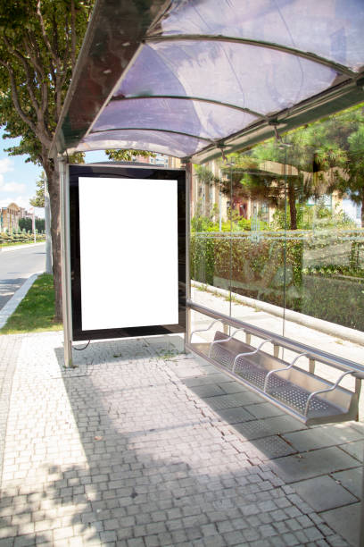 istock advertising board at bus stop on asphalt road 1166480771