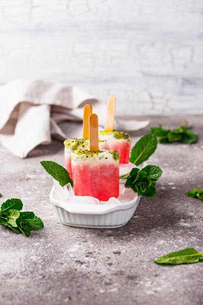 istock Homemade popsicles in shape of watermelon 1166480887