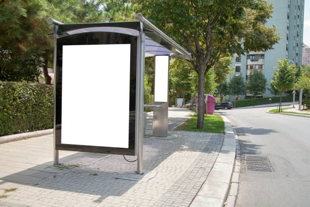 istock advertising board at bus stop on asphalt road 1166480894