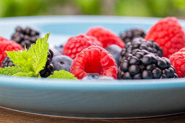 istock Bunch of mix forest wild berries 1166488683