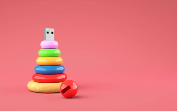 istock Flash drive as kid's toy concept on red background. 1166496233