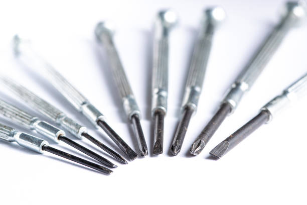 istock Mini screwdriver set closeup macro isolated on white background 1166496303