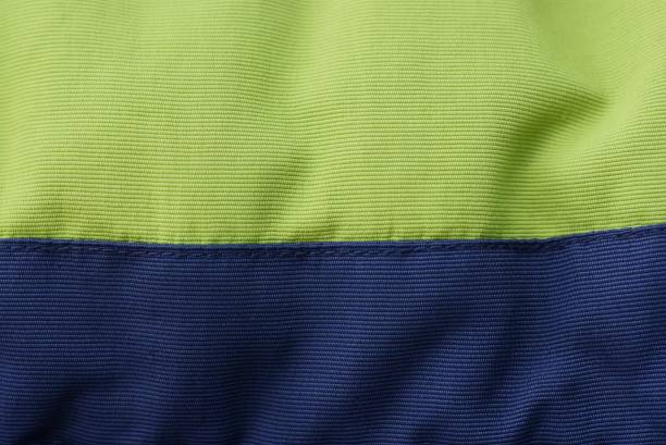 istock black  green  fabric texture from a piece of crumpled matter 1166497105