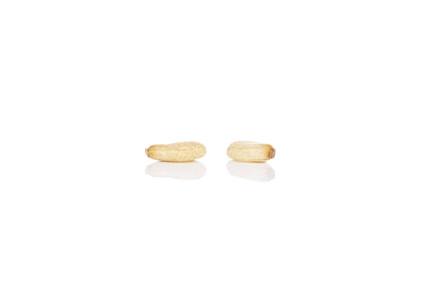 Unpeeled sesame seeds isolated on white