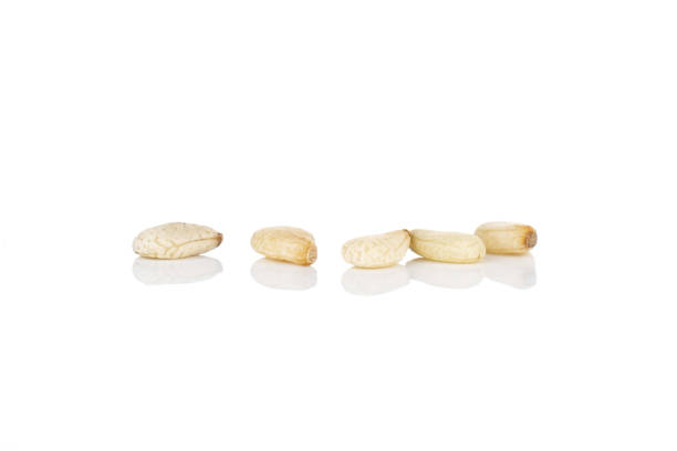 istock Unpeeled sesame seeds isolated on white 1166497213