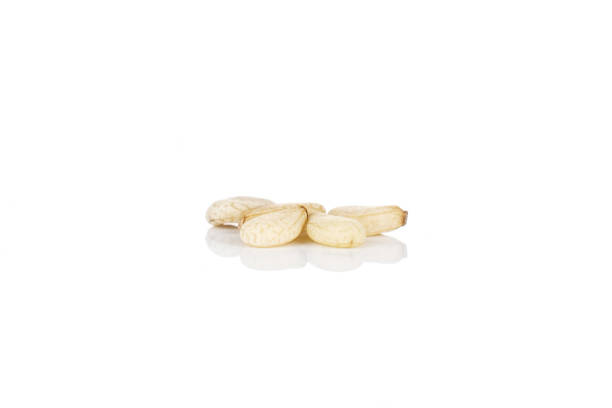istock Unpeeled sesame seeds isolated on white 1166497247