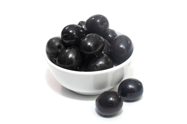 istock Black olives in a plate isolated 1166497466
