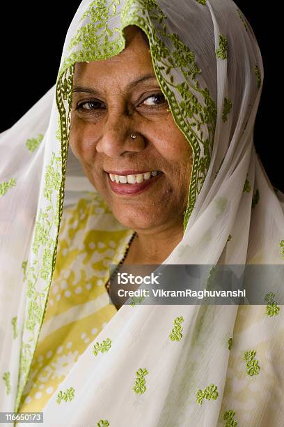 Senior Asian Woman In Traditional Attire Sari Dark Background Stock Photo - Download Image Now