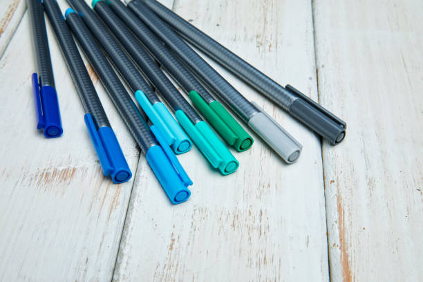 istock Art supplies on retro wood background 1166504441