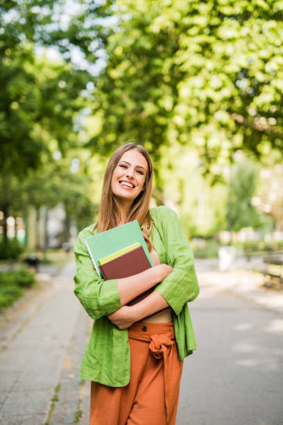 istock Happy young female student looking at camera. 1166505304