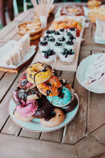 Delicious Donuts cake with chocolate topping. Festive family or party snack concept. Overhead view.