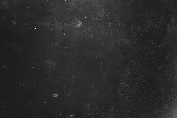 Dust and scratches design. Distressed photo editor layer. Black abstract background. Copy space.