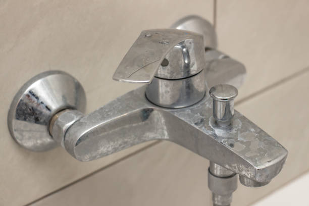 istock Plumbing fixtures cleaning process from limescale 1166511753